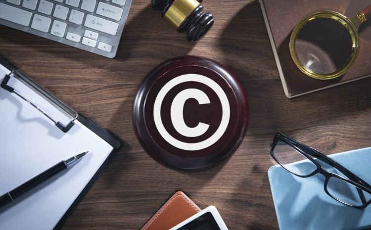 Judge gavel with a business objects. Copyright. Intellectual Property